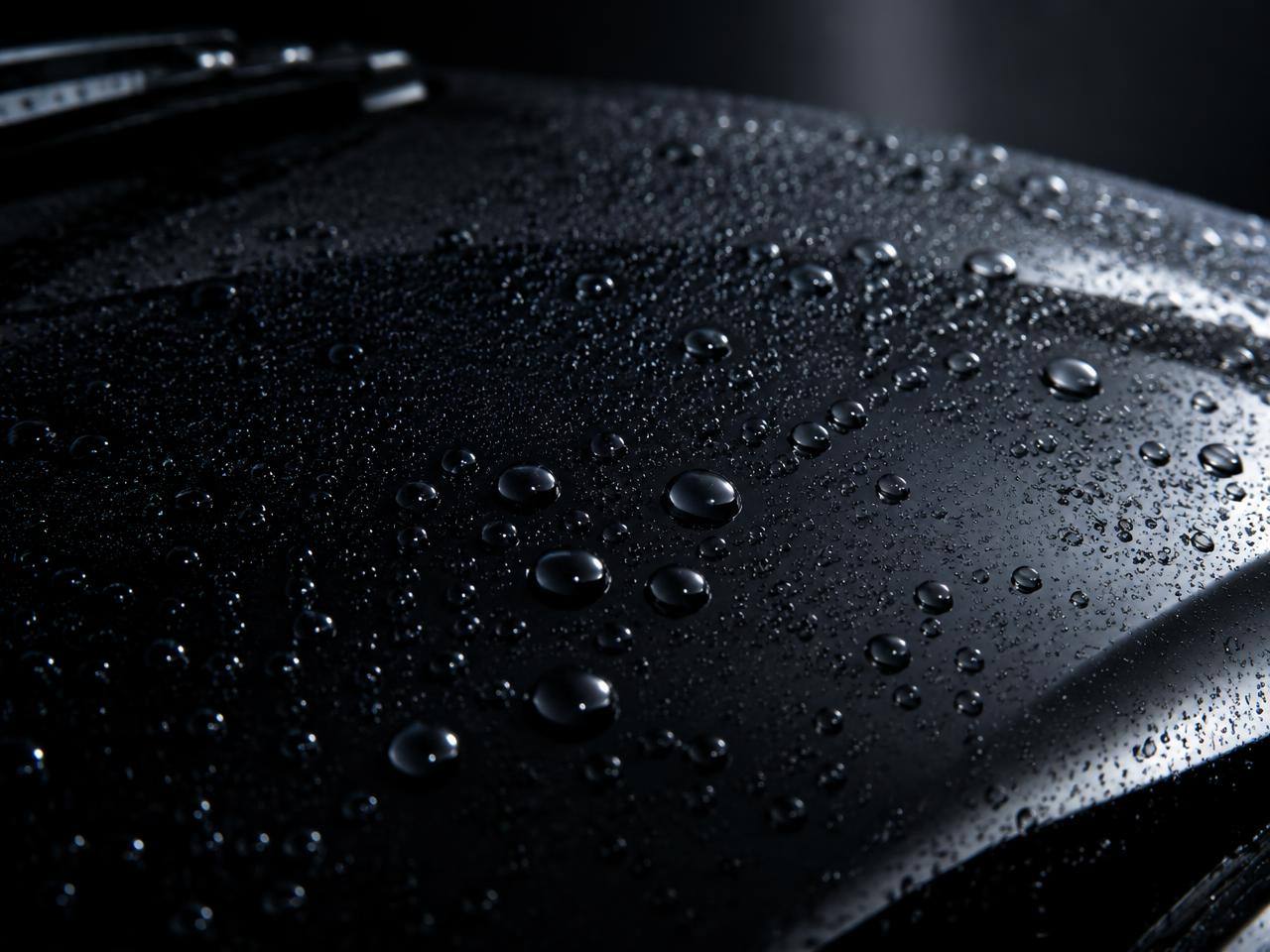 Water beading on a ceramic coated black hood