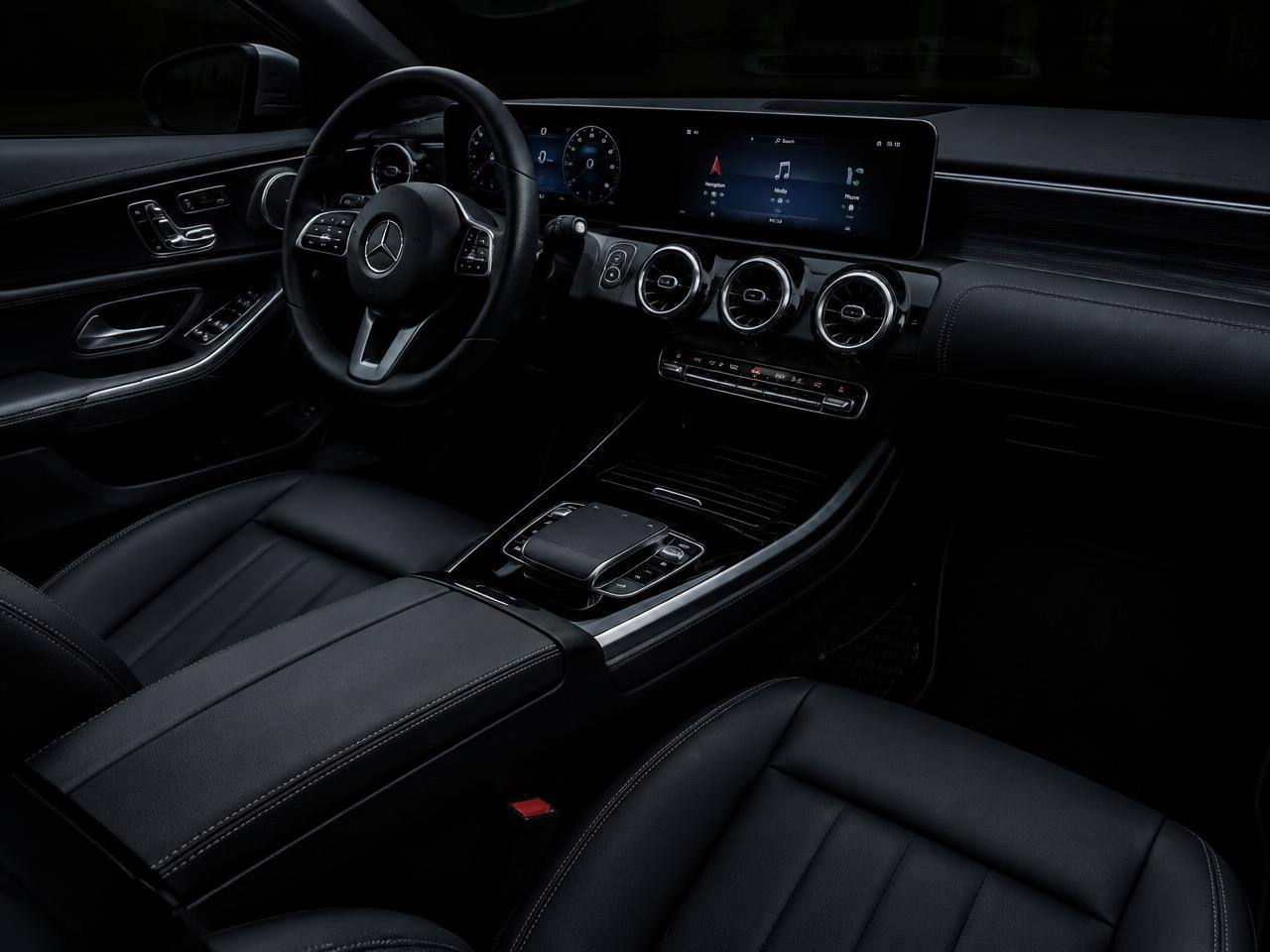 After: Clean black leather interior (placeholder image)